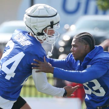 Bills defensive backs Cole Bishop, left, and Te'Cory Couch get in extra work on coverage before the start of day three of training camp.