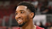 Cleveland Cavaliers guard Donovan Mitchell warms up and smiles prior to a game against the Chicago Bulls.