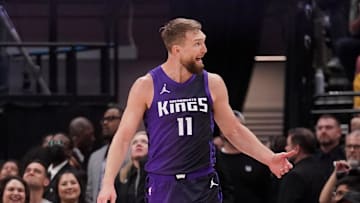 Mar 24, 2025; Sacramento, California, USA; Sacramento Kings center Domantas Sabonis (11) reacts after the Kings made a basket while being fouled against the Boston Celtics in the first quarter at the Golden 1 Center. Mandatory Credit: Cary Edmondson-Imagn Images