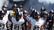 The Purdue Boilermakers take to the field