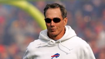 Buffalo Bills head coach Dick Jauron heads onto the field for the start of a game against the New Orleans Saints in the first half at Ralph Wilson Stadium.