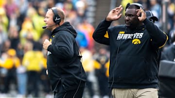 Seth Wallace, left, and Iowa defensive line coach Kelvin Bell call out to players during a NCAA Big Ten Conference football game between the Iowa Hawkeyes and Purdue, Saturday, Oct., 19, 2019, at Kinnick Stadium in Iowa City, Iowa.