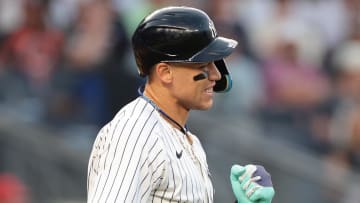 Jun 18, 2024; Bronx, New York, USA; New York Yankees center fielder Aaron Judge (99) reacts after being hit by a pitch during the third inning against the Baltimore Orioles at Yankee Stadium. Mandatory Credit: Vincent Carchietta-USA TODAY Sports