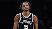 Dec 6, 2025; Brooklyn, New York, USA; Brooklyn Nets center Nic Claxton (33) reacts after being fouled by New Orleans Pelicans center Derik Queen (22) during the first quarter at Barclays Center. Mandatory Credit: Vincent Carchietta-Imagn Images