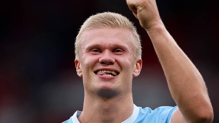 Erling Haaland smiles during Manchester United v Manchester City