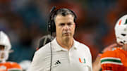 Nov 15, 2025; Miami Gardens, Florida, USA; Miami Hurricanes head coach Mario Cristobal watches from the sideline against NC State Wolfpack during the third quarter at Hard Rock Stadium. Mandatory Credit: Sam Navarro-Imagn Images