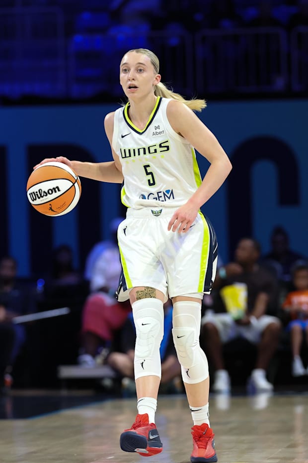 Dallas Wings guard Paige Bueckers dribbles against the Phoenix Mercury