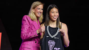 Apr 14, 2025; New York, New York, USA; Kaitlyn Chen poses with WNBA commissioner Cathy Engelbert after being selected with the number thirty overall pick to the Golden State Valkyries in the 2025 WNBA Draft at The Shed at Hudson Yards. Mandatory Credit: Vincent Carchietta-Imagn Images