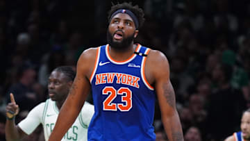 May 5, 2025; Boston, Massachusetts, USA; New York Knicks center Mitchell Robinson (23) returns up court against the Boston Celtics in the second quarter during game one of the second round for the 2025 NBA Playoffs at TD Garden. Mandatory Credit: David Butler II-Imagn Images