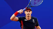 Jul 28, 2024; Paris, France; Andy Murray (GBR) plays against Taro Daniel (JPN) and Kei Nishikori (JPN) in the men’s tennis doubles first round during the Paris 2024 Olympic Summer Games at Stade Roland Garros. 