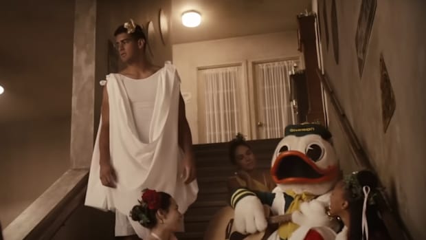 Marcus Mariota and The Oregon Duck in the a music video for "Shout."