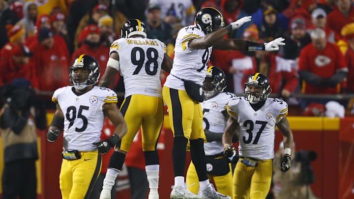 Jan 15, 2017; Kansas City, MO, USA; Pittsburgh Steelers inside linebacker Vince Williams (98) and inside linebacker Lawrence Timmons (94) celebrate after a play during the second quarter against the Kansas City Chiefs in the AFC Divisional playoff game at Arrowhead Stadium. Mandatory Credit: Jay Biggerstaff-Imagn Images