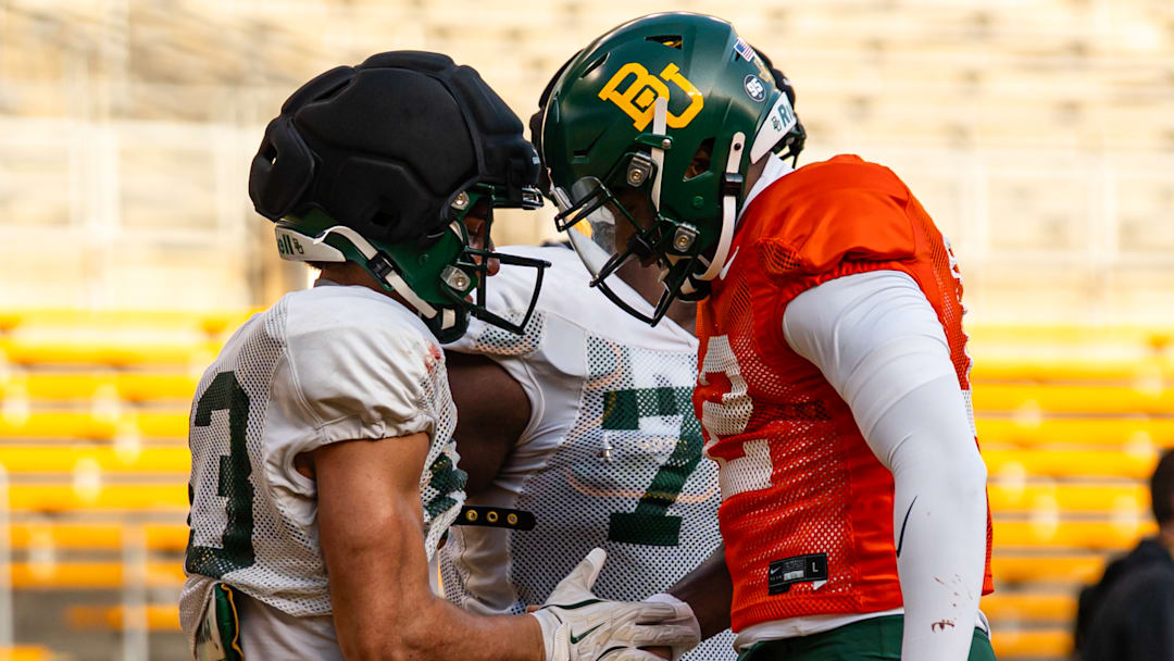 DJ Lagway and Jadon Porter celebrating a score in Spring Ball
