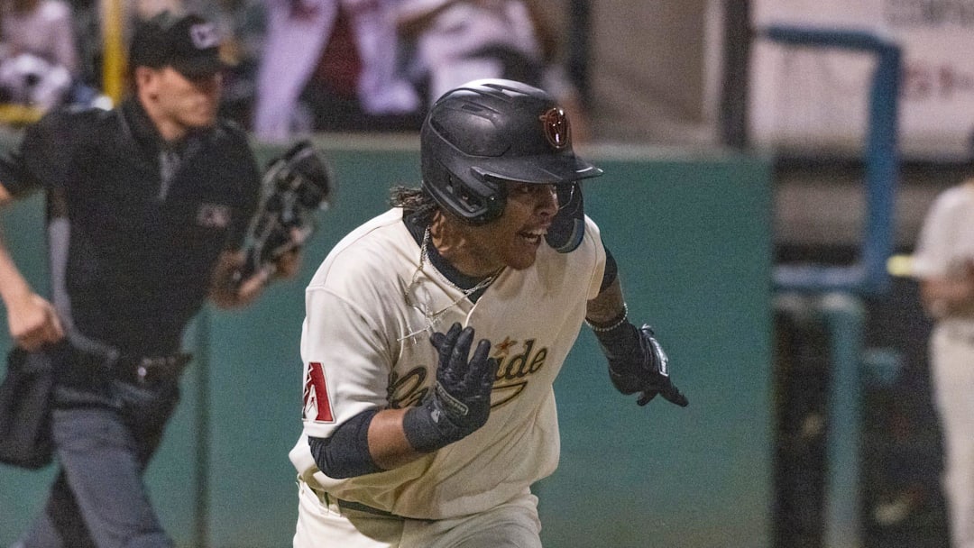 Visalia Rawhide's Christian Cerda runs to first Tuesday, April 11, 2023 during their home opener against the Rancho Cucamonga Quakes.

0411 Bb Rc Rawhide 8375t