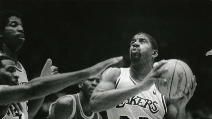 Unknown date; Los Angeles,USA: FILE PHOTO; Los Angeles Lakers guard Magic Ervin Johnson (32) in action against the Chicago Bulls guard Michael Jordan (23) at The Forum. Mandatory Credit: Malcolm Emmons- Imagn Images