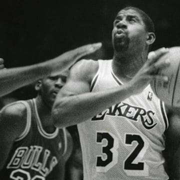 Unknown date; Los Angeles,USA: FILE PHOTO; Los Angeles Lakers guard Magic Ervin Johnson (32) in action against the Chicago Bulls guard Michael Jordan (23) at The Forum. Mandatory Credit: Malcolm Emmons- Imagn Images