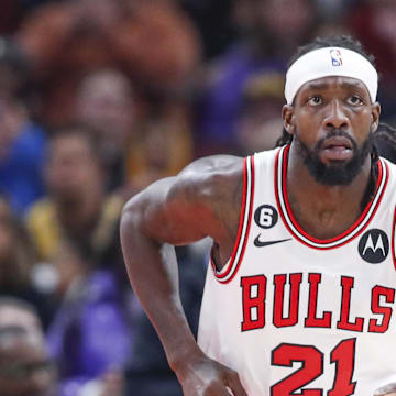 Mar 29, 2023; Chicago, Illinois, USA; Chicago Bulls guard Patrick Beverley (21) brings the ball up court against the Los Angeles Lakers during the first half at United Center. 