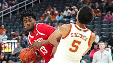 Nov 4, 2024; Las Vegas, Nevada, USA; Ohio State Buckeyes forward Sean Stewart (13) fouls Texas Longhorns forward Kadin Shedrick (5) during the second half at T-Mobile Arena. Mandatory Credit: Stephen R. Sylvanie-Imagn Images