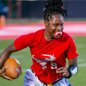 Bradford Nichelle Brown (5) dives for yards during an FHSAA flag football game against Middleburg at Bradford High School in Stark, FL on Wednesday, April 17, 2024. [Alan Youngblood/Gainesville Sun]