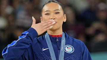 Sunisa Lee of the United States reacts after winning the bronze medal on the second day of gymnastics event finals during the Paris 2024 Olympic Summer Games.