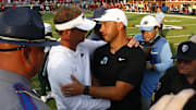 Sep 20, 2025; Oxford, Mississippi, USA; Mississippi Rebels head coach Lane Kiffin (left) and Tulane Green Wave head coach Jon Sumrall (right) embrace after the game at Vaught-Hemingway Stadium. Mandatory Credit: Petre Thomas-Imagn Images