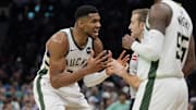Nov 16, 2024; Charlotte, North Carolina, USA; Milwaukee Bucks forward Giannis Antetokounmpo (34) argues a call with referee Brandon Schwab (86) during the second half against the Charlotte Hornets at Spectrum Center. Mandatory Credit: Jim Dedmon-Imagn Images