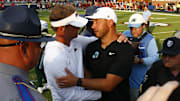 Sep 20, 2025; Oxford, Mississippi, USA; Mississippi Rebels head coach Lane Kiffin (left) and Tulane Green Wave head coach Jon Sumrall (right) embrace after the game at Vaught-Hemingway Stadium. Mandatory Credit: Petre Thomas-Imagn Images