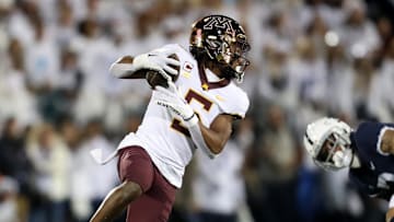 Oct 22, 2022; University Park, Pennsylvania, USA; Minnesota Golden Gophers defensive back Justin Walley (5) runs with the ball following an interception during the first quarter against the Penn State Nittany Lions at Beaver Stadium. 