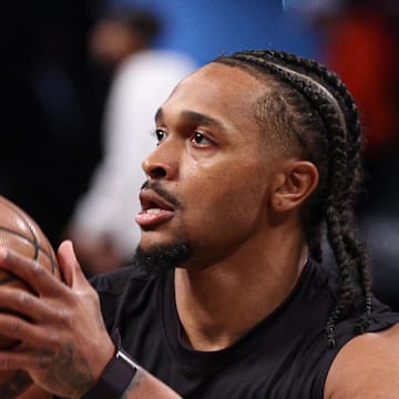 Apr 13, 2025; Brooklyn, New York, USA; Brooklyn Nets guard Tyson Etienne (10) warms up before the game against the New York Knicks at Barclays Center. Mandatory Credit: Vincent Carchietta-Imagn Images