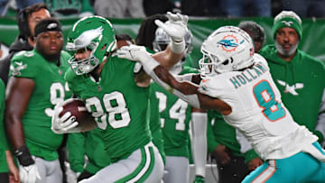 Oct 22, 2023; Philadelphia, Pennsylvania, USA; Philadelphia Eagles tight end Dallas Goedert (88) is pushed out of bounds by Miami Dolphins safety Jevon Holland (8)  during the first quarter at Lincoln Financial Field.  