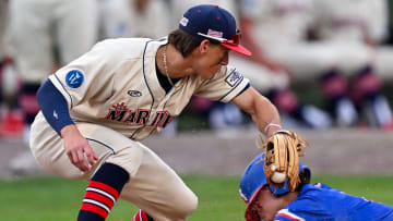 HARWICH 06/24/24 Austin Overn of Chatham arrives safely at third ahead of the tag by Jake Ogden of Harwich for a triple. Cape League baseball
Ron Schloerb/Cape Cod Times