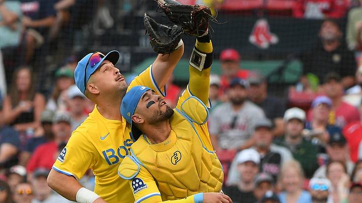 Sep 27, 2025; Boston, Massachusetts, USA; Boston Red Sox first baseman Nathaniel Lowe (37) and catcher Carlos Narvaez (75) track down a popup during the fifth inning against the Detroit Tigers at Fenway Park. Mandatory Credit: Bob DeChiara-Imagn Images