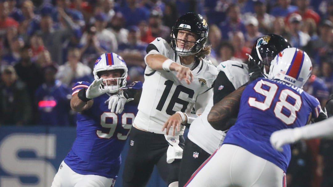 Bills defensive end Casey Toohill closes in on Jaguars quarterback Trevor Lawrence.