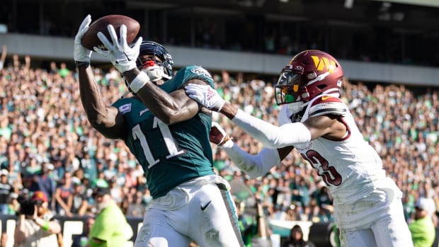 Washington Commanders cornerback Emmanuel Forbes against Philadelphia Eagles receiver A.J. Brown.