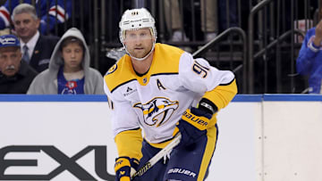 Nov 10, 2025; New York, New York, USA; Nashville Predators center Steven Stamkos (91) skates with the puck against the New York Rangers during the third period at Madison Square Garden. Mandatory Credit: Brad Penner-Imagn Images