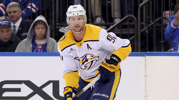 Nov 10, 2025; New York, New York, USA; Nashville Predators center Steven Stamkos (91) skates with the puck against the New York Rangers during the third period at Madison Square Garden. Mandatory Credit: Brad Penner-Imagn Images Nov 10, 2025; New York, New York, USA; Nashville Predators center Steven Stamkos (91) skates with the puck against the New York Rangers during the third period at Madison Square Garden. Mandatory Credit: Brad Penner-Imagn Images