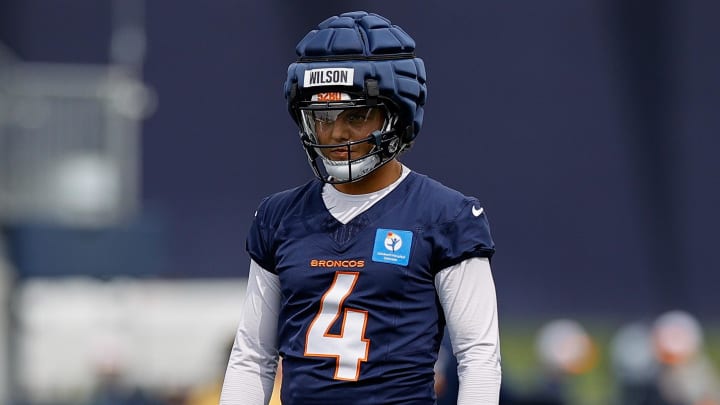 Jul 26, 2024; Englewood, CO, USA; Denver Broncos quarterback Zach Wilson (4) during training camp at Broncos Park Powered by CommonSpirit. 