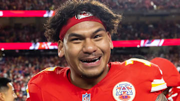 Kansas City Chiefs offensive tackle Kingsley Suamataia (76) celebrates after defeating the Buffalo Bills in the AFC Championship game at GEHA Field at Arrowhead Stadium.