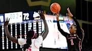 Vanderbilt guard Mikayla Blakes (1) makes a basket in front of Mississippi State center Madina Okot (15) tying the game in overtime during a NCAA college basketball game Thursday, Feb. 13, 2025, in Nashville, Tenn.
