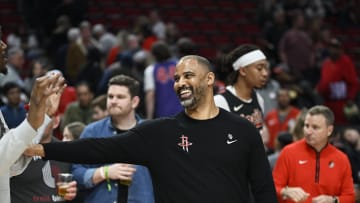 Apr 12, 2024; Portland, Oregon, USA; Houston Rockets head coach Ime Udoka visits with Portland Trail Blazers center Robert Williams III (35) after a game at Moda Center. Mandatory Credit: Troy Wayrynen-USA TODAY Sports