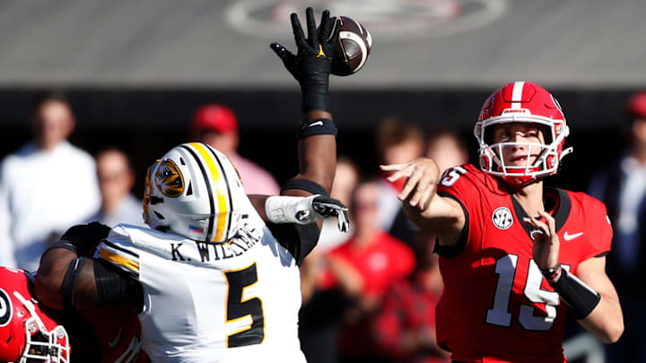 Missouri defensive lineman Kristian Williams (5) deflects a pass from Georgia quarterback Carson Beck (15) during the first half of a NCAA college football game against Missouri in Athens, Ga., on Saturday, Nov. 4, 2023.