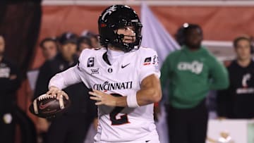 Nov 1, 2025; Salt Lake City, Utah, USA; Cincinnati Bearcats quarterback Brendan Sorsby (2) throws the ball against the Utah Utes during the second quarter at Rice-Eccles Stadium. Mandatory Credit: Rob Gray-Imagn Images