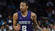 Charlotte Hornets guard Nick Smith Jr. (8) drives to the basket against the Chicago Bulls during the first quarter at Spectrum Center.