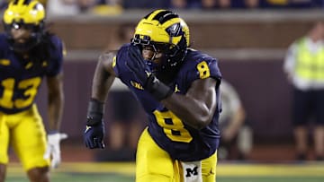 Aug 31, 2024; Ann Arbor, Michigan, USA;  Michigan Wolverines defensive end Derrick Moore (8) pursues a play against the Fresno State Bulldogs at Michigan Stadium. Mandatory Credit: Rick Osentoski-Imagn Images