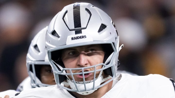 Aug 23, 2025; Glendale, Arizona, USA; Las Vegas Raiders guard Alex Cappa (65) against the Arizona Cardinals during a preseason NFL game at State Farm Stadium. Mandatory Credit: Mark J. Rebilas-Imagn Images
