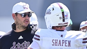 Mississippi State Bulldogs head coach Jeff Lebby speaks with quarterback Blake Shapen (2) during the fourth quarter against the Florida Gators at Davis Wade Stadium at Scott Field.