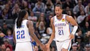 Nov 25, 2024; Sacramento, California, USA; Oklahoma City Thunder guard Cason Wallace (22) high fives guard Aaron Wiggins (21) during the second quarter of the game against the Sacramento Kings at Golden 1 Center. Mandatory Credit: Ed Szczepanski-Imagn Images