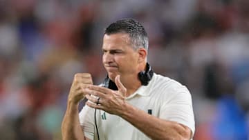 Sep 20, 2025; Miami Gardens, Florida, USA; Miami Hurricanes head coach Mario Cristobal reacts against the Florida Gators during the first quarter at Hard Rock Stadium. Mandatory Credit: Sam Navarro-Imagn Images
