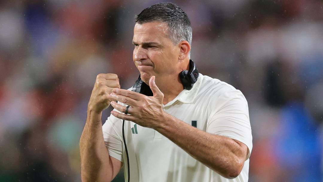 Sep 20, 2025; Miami Gardens, Florida, USA; Miami Hurricanes head coach Mario Cristobal reacts against the Florida Gators during the first quarter at Hard Rock Stadium. Mandatory Credit: Sam Navarro-Imagn Images