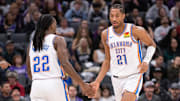 Nov 25, 2024; Sacramento, California, USA; Oklahoma City Thunder guard Cason Wallace (22) high fives guard Aaron Wiggins (21) during the second quarter of the game against the Sacramento Kings at Golden 1 Center. Mandatory Credit: Ed Szczepanski-Imagn Images